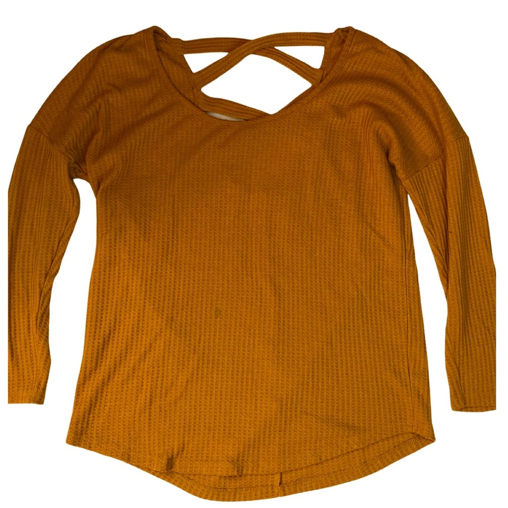 Orange long sleeve low cut open back shirt.